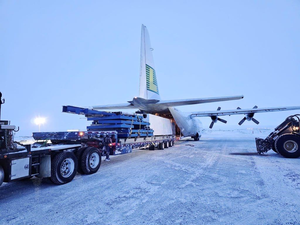 Loading oversized equipment into Hercules aircraft.